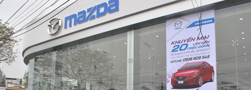 Vệ sinh lau bảng hiệu, ALU mặt tiền showroom ô tô Mazda Hải Phòng 
